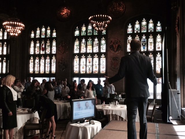 Tim Shurr addressing an industry audience at a professional association event