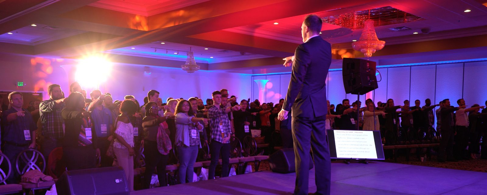 Tim Shurr leading an engaged sales conference audience